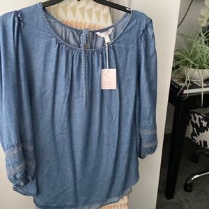 Tencel fabric 3/4 sleeve tunic; never worn w/tie behind neck